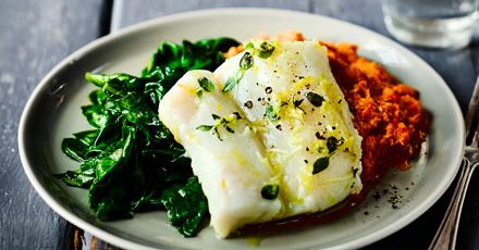 Herb & garlic baked cod with romesco sauce & spinach